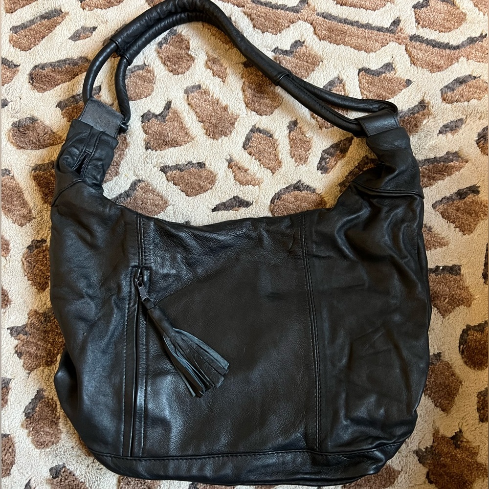 Wilson’s black leather bag
